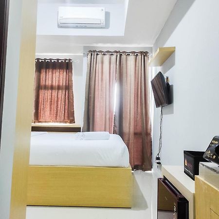 Comfy And Minimalist Studio At Vida View Apartment By Travelio Pampang Buitenkant foto